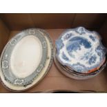 A quantity of 19th Century and later plates and serving plates including blue and white