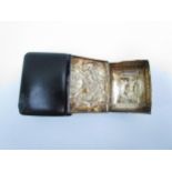 A miniature Holy Bible possibly made from slate/coal and a silver gilt snuff box with animal and