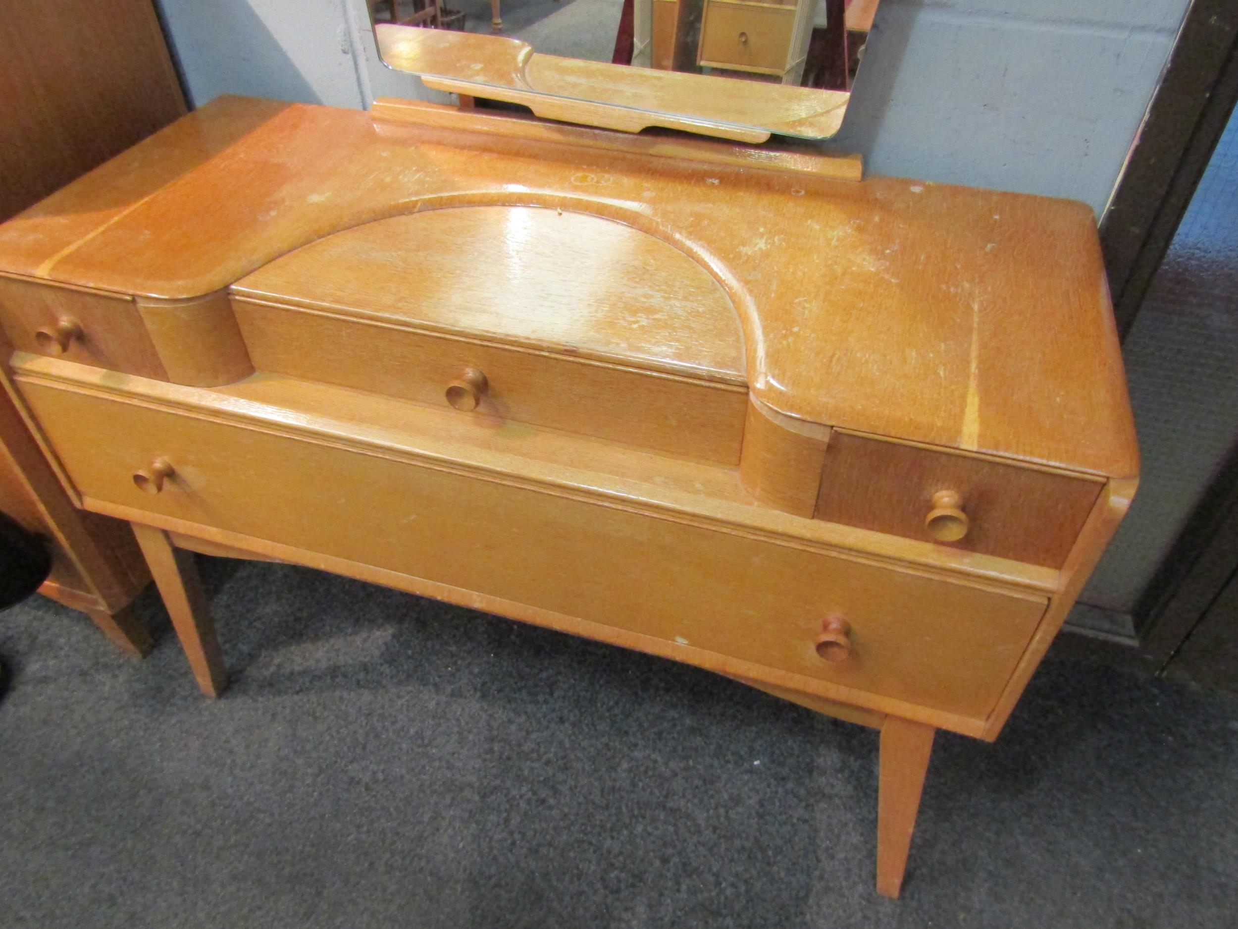 A 1960s Austinsuite light oak dressing table with four drawers, mirror back and splayed legs, - Image 2 of 6