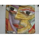 A modernist Turkish embroidered wall hanging in the style of Picasso, depicting an abstract face,