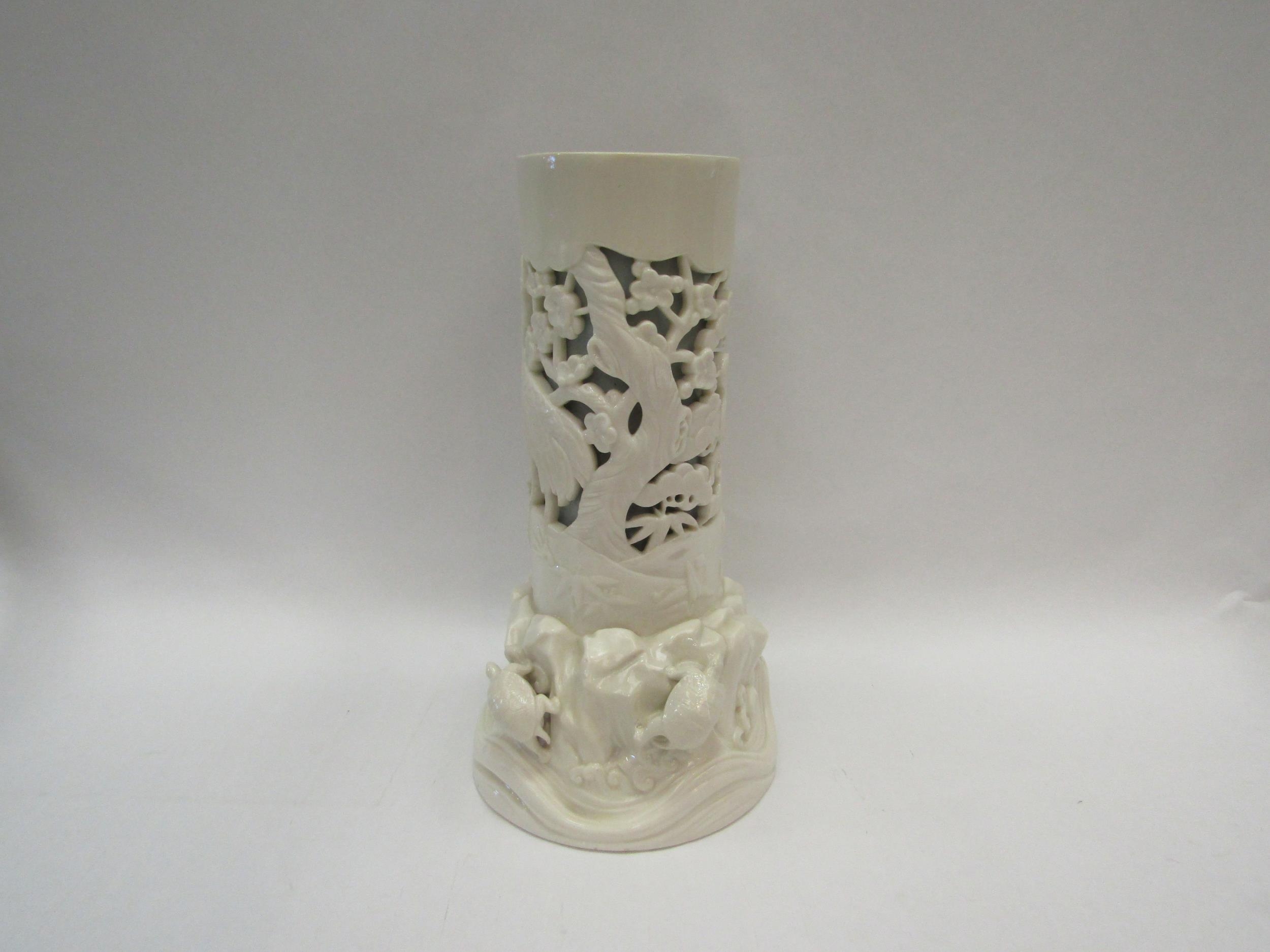 A Royal Worcester porcelain vase with pierced design of exotic birds blossoming in foliage, tortoise