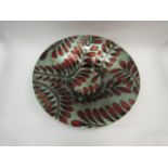 A vintage style art glass table centrepiece bowl with red foliate design on a silvered ground,
