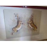 JOHN RYAN: An acrylic of boxing hares, signed lower right, 60cm x 80cm
