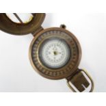 A T.G. Co. Ltd. of London military compass marked P143 to rear, crack to glass