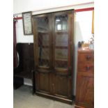 A Jaycee Furniture Ltd. oak Old Charm style lead glazed china display cabinet, the two glazed