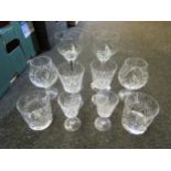 A box of crystal tumblers, wine, hock and brandy glasses