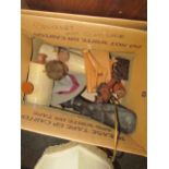 Two boxes of mixed items, treen, lamp, stone bed warmers, carved wooden animals etc