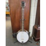 A Martin Smith banjo-guitar, six string