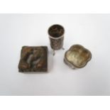 Two Chinese white metal items, a salt with exterior scenes and a miniature vase on tripod feet