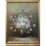 S.BARTON: Impasto oil on canvas, a large display of coloured flowers in a vase, signed lower