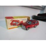 A Dinky fire chief's car in original box, a Matchbox 1938 Lagonda Drophead Coupe and a Matchbox 1913