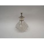 A white metal and glass perfume bottle, stamped Sterling Robinson & Co Singapore & Kuala Lumpur,