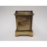 Waterbury (USA) miniature carriage clock ca. 1900, 4" x 3" x 2". brass case, glass side panels,