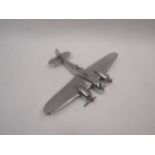 An alloy model of a WWII era bomber aircraft, 16.5 x 23.5cm, together with a Battle of Britain