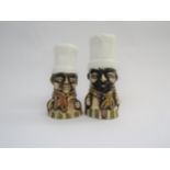 A rare Chelsea Pottery pair of salt and pepper pots in the form of chefs. Marked 'Chelsea' to one.