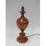 Brian Watts: A turned yew wood lamp base, maker's label to base, 46cm high