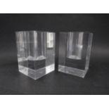 A pair of Franco Mariotti clear Perspex candle holders of square form. Marks to bases 15cm high