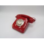 A Red rotary DT 746 F model telephone 1962-1970's