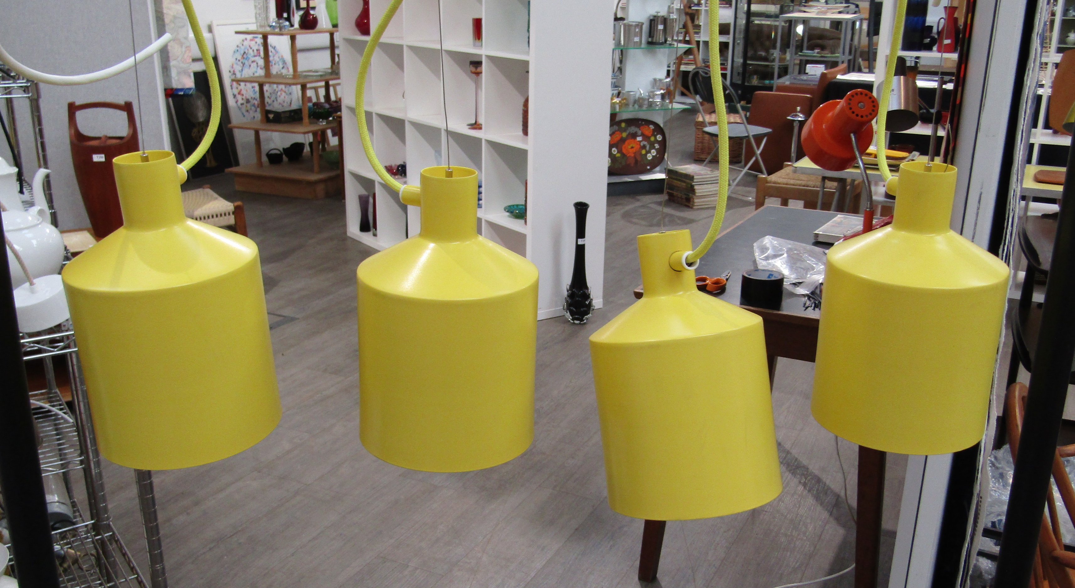 A set of four yellow ceiling pendant lights, 'zero silo' 15cm diameter