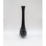 A tall art glass vase in black with clear overlay and pulled detail. 52cm high