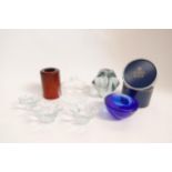 A collection of Scandinavian glass candle/ tea light holders including Kosta Boda, Orresfors,