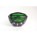 An Orrefors glass bowl designed by Erika Lagerbielke in green with mottled blue and amethyst