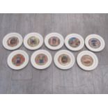 Nine Hornsea Pottery Christmas plates from the 1980's, each with printed medieval scene and
