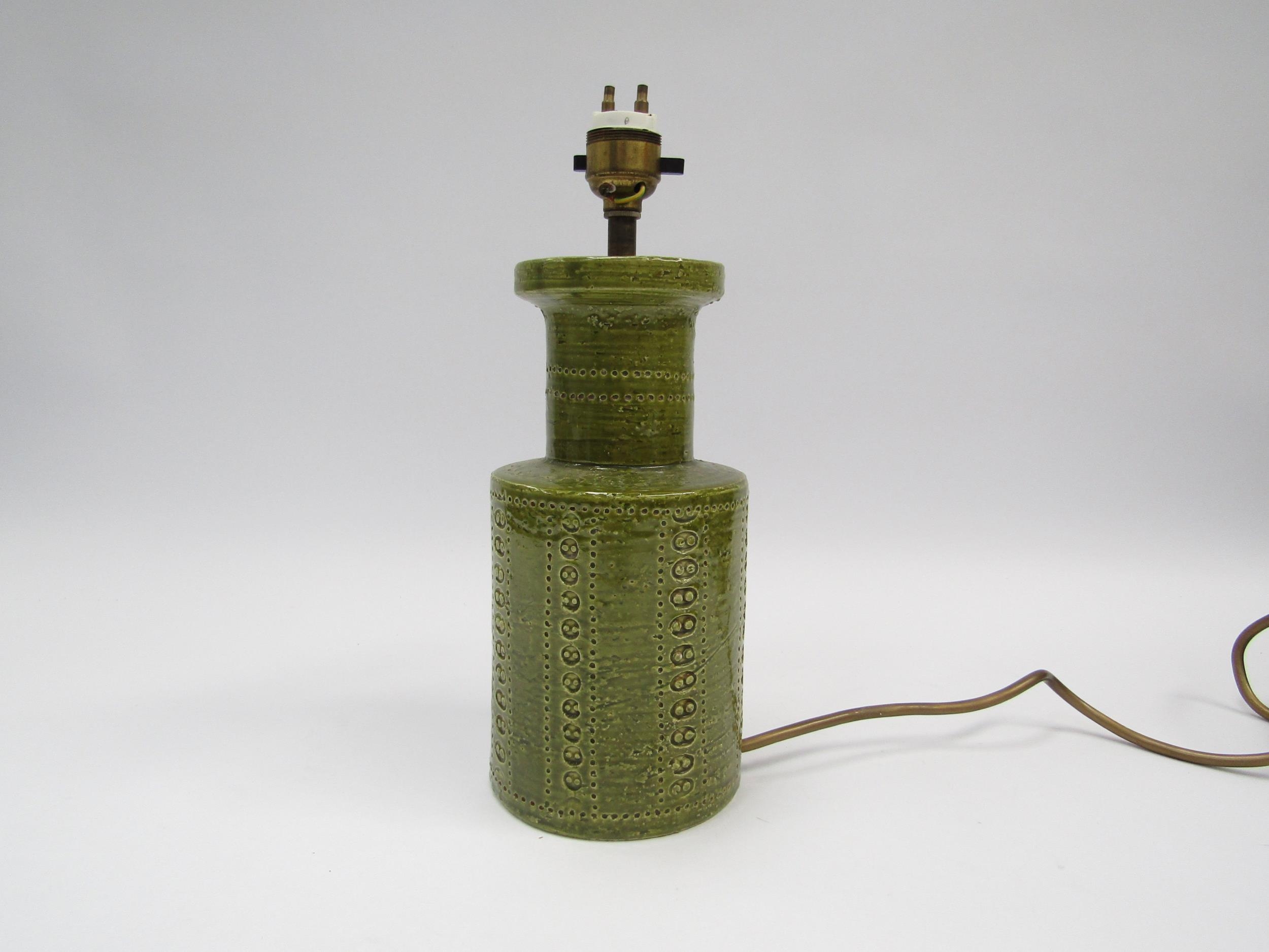 An Italian Bitossi lamp base with green glaze and impressed motif detail, 21.5cm high without