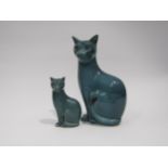 Two Poole Pottery figures of Cats, blue glazed with blade detail. Tallest 29.5cm diameter