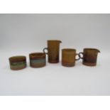 ROBIN WELCH (1936-2019) Five standard domestic stoneware jugs, cups and pots. Tallest 14cm