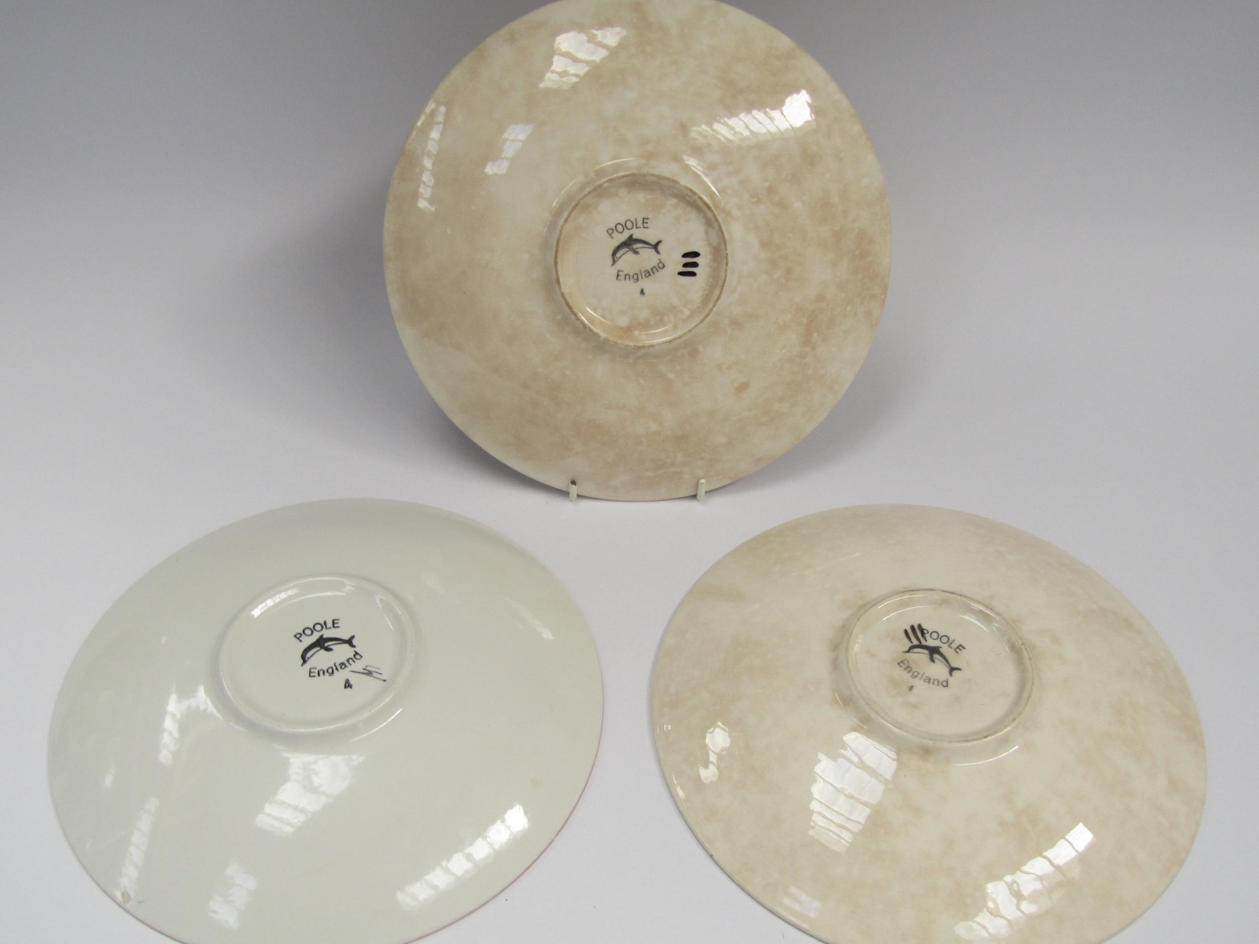 Three Poole Pottery Delphis plates, various designs, black backstamps. 27cm diameter - Image 2 of 2