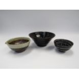 Three Japanese studio pottery bowls, signed with stamped seals, largest 22cm diameter