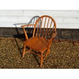 An early Ercol child's chair, stamped to seat.