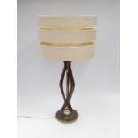 An original 1970's teak and brass metal lamp base and shade, 70cm high