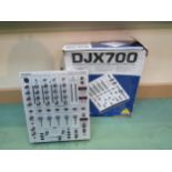 A boxed DJX700 DJ Mixer