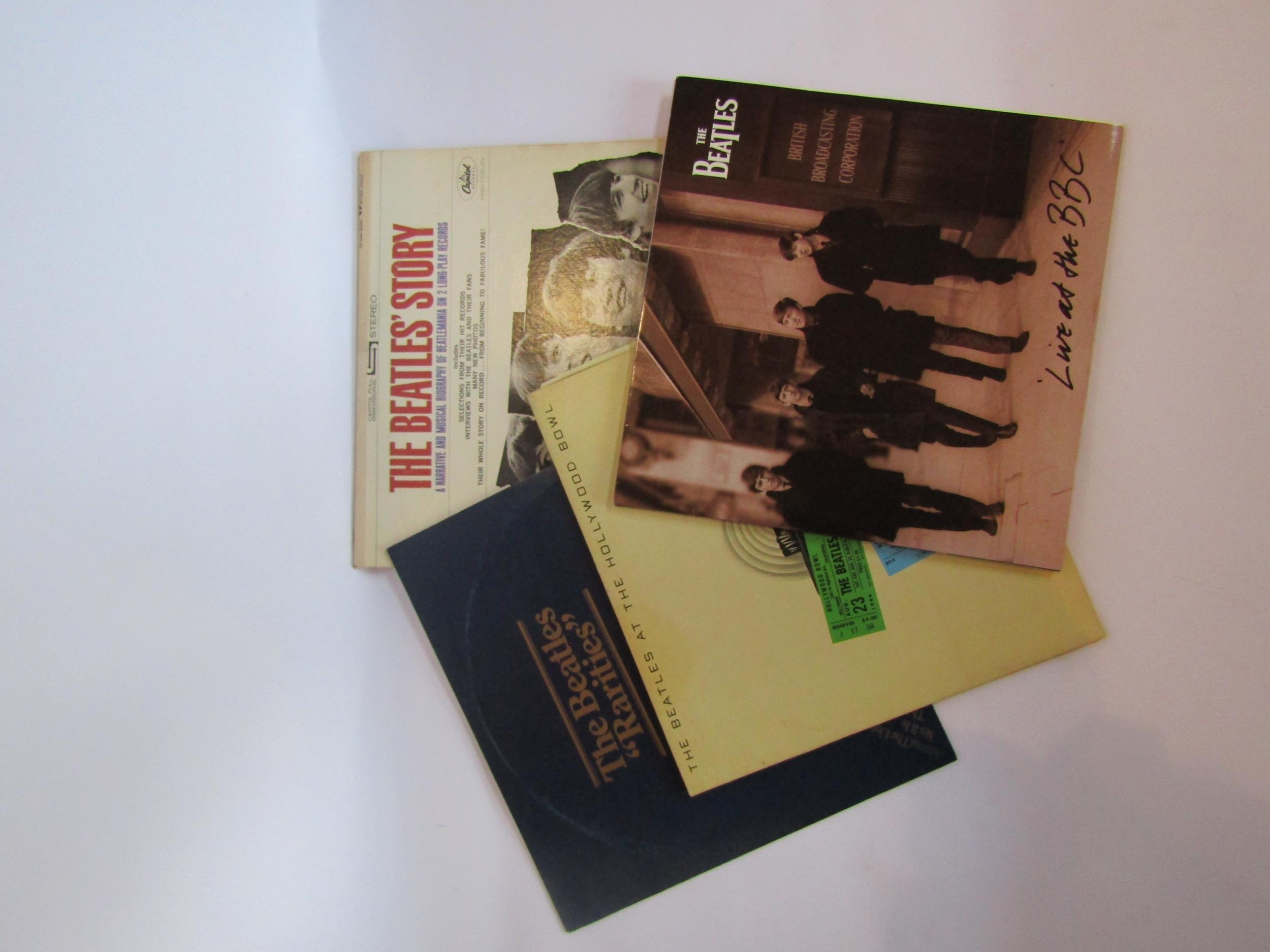 THE BEATLES: A group of four LP's to include 'The Beatles Story' (STBO 2222), 'Rarities' (PCM