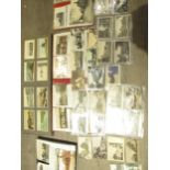 Four photograph albums containing over 400 postcards and loose examples, local topographical Norfolk