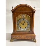 An Edwardian inlaid mahogany quarter striking bracket clock with a quality Lenzkirch German