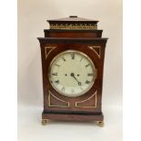 A Regency mahogany and brass mounted bracket clock, twin fusee striking movement with a rack and