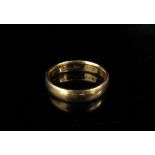 A 22ct gold wedding band. Size K, 4.1g