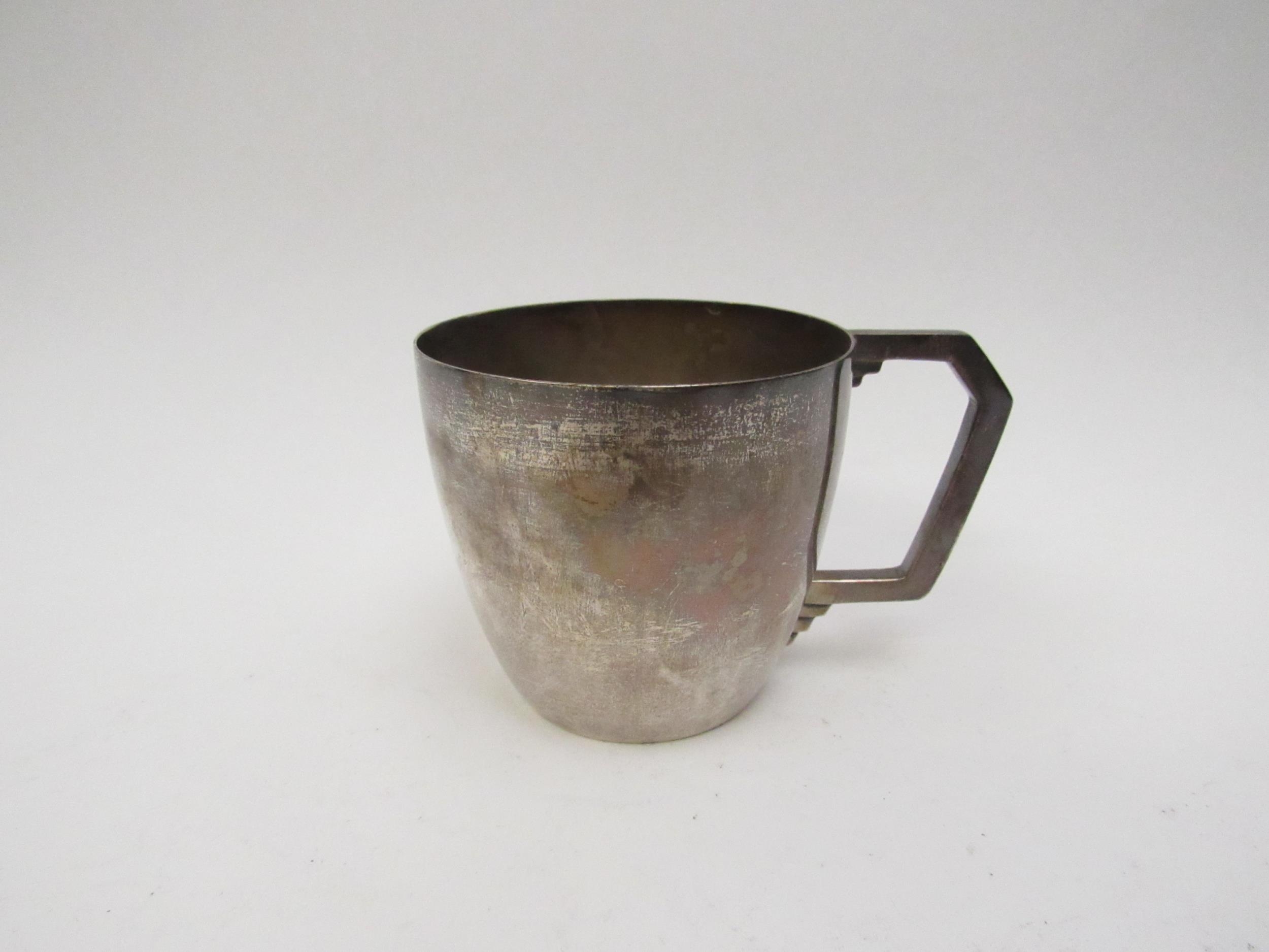 A Turner & Simpson Ltd., silver Deco form mug/cup, Birmingham 1935, 7cm tall, 148g