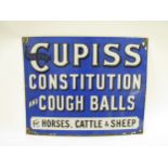 An enamel sign "Ask For Cupiss Constitution And Cough Balls For Horses, Cattle & Sheep", light