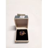 A gold ring set with an opal in rope twist mount, unmarked. Size L/M, 2.2g