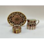 Three Royal Crown Derby Imari items, jug, oval dish and lidded trinket box