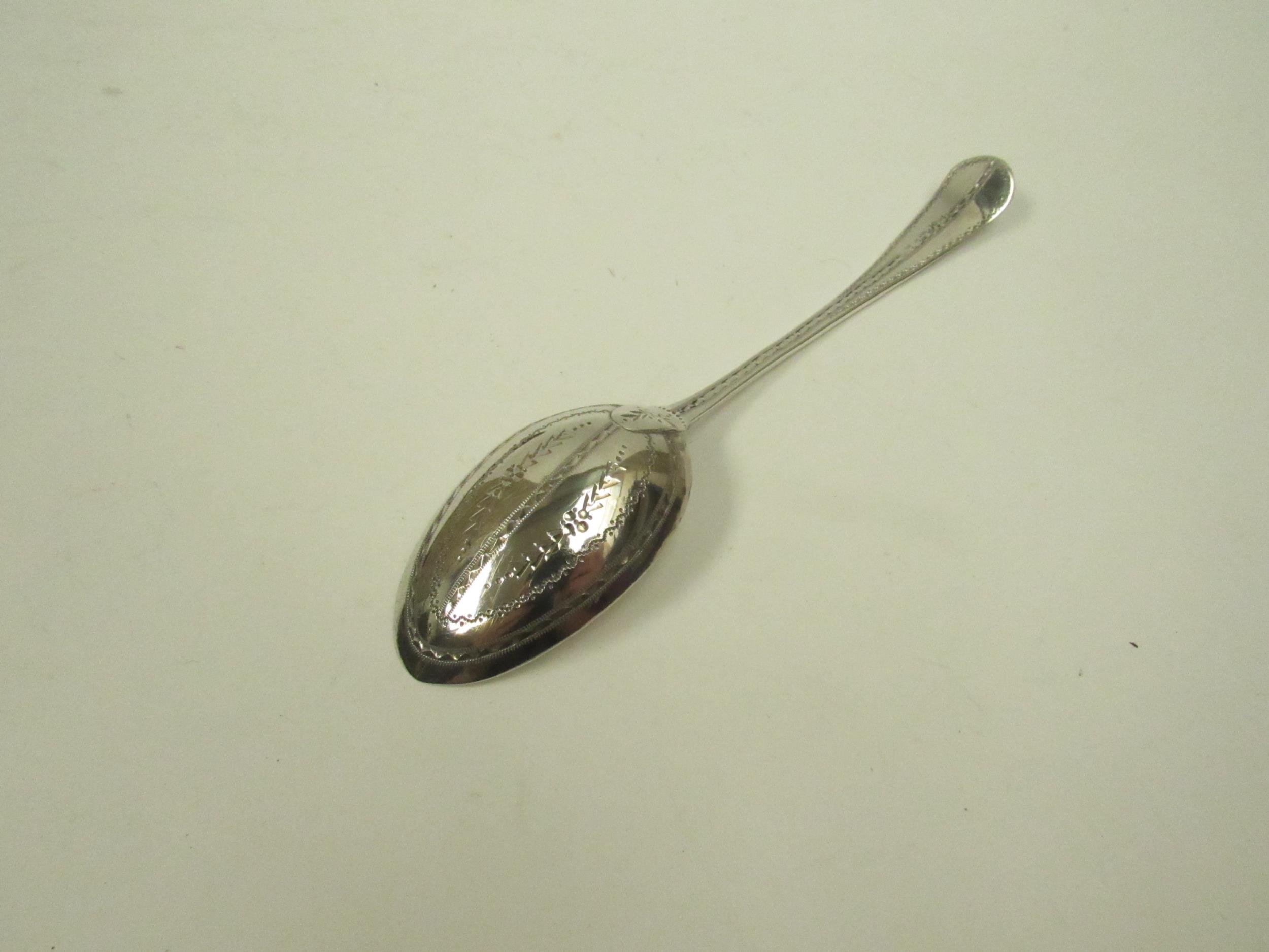 A silver spoon with bright cut detail marks indistinguishable in Mappin & Webb case, 24g - Image 3 of 3