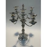 A plated five sconce candelabra with flame form knop, Barker-Ellis, 54cm tall