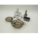 A mixed lot of silver, including 5 bar toast rack, pepperette, salt, and two pierced dishes, various