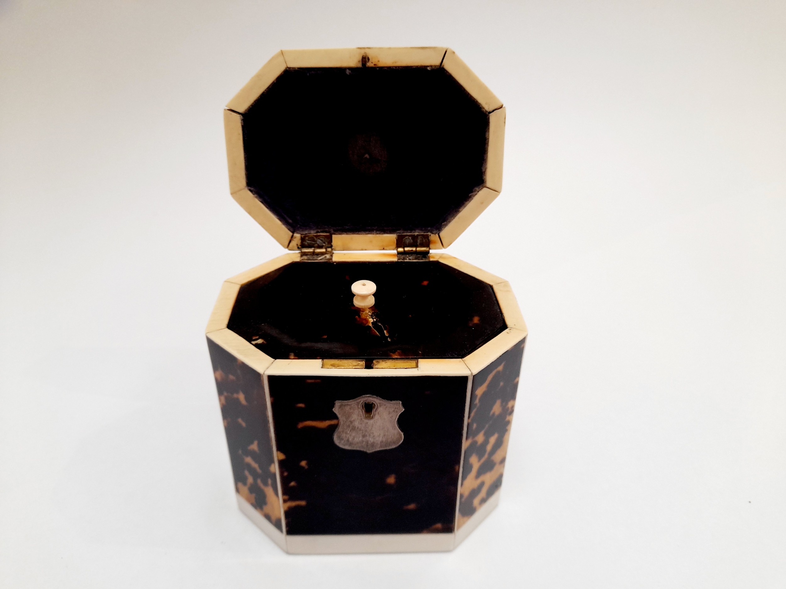 A Georgian tortoiseshell veneered tea caddy of canted rectangular form, with inner lid, ivory - Image 2 of 4