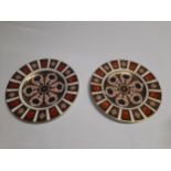 A pair of Royal Crown Derby 1128 Imari pattern plates, 23cm diameter