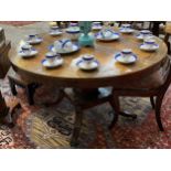 A 19th Century Regency rosewood breakfast table with boulle work style border, square column to